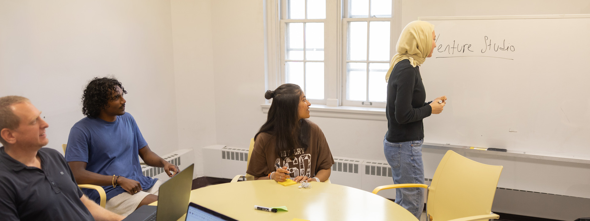 a group of students and alumni work at Lehigh Venture Studio