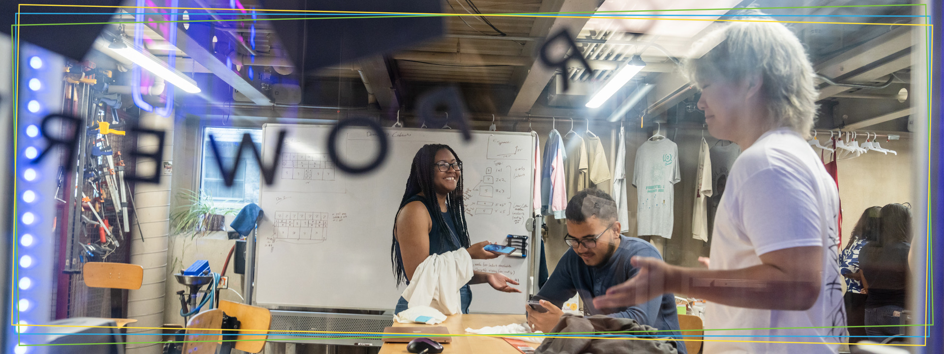 a group of students learning about entrepreneurship in a creative lab