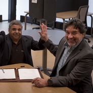 Rick Smith, Dr. Sudhakar Neti &amp; Dr. Carlos Romero celebrate EST's express license